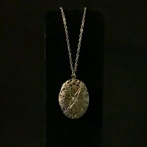 Locket Pendant Necklace Glows?